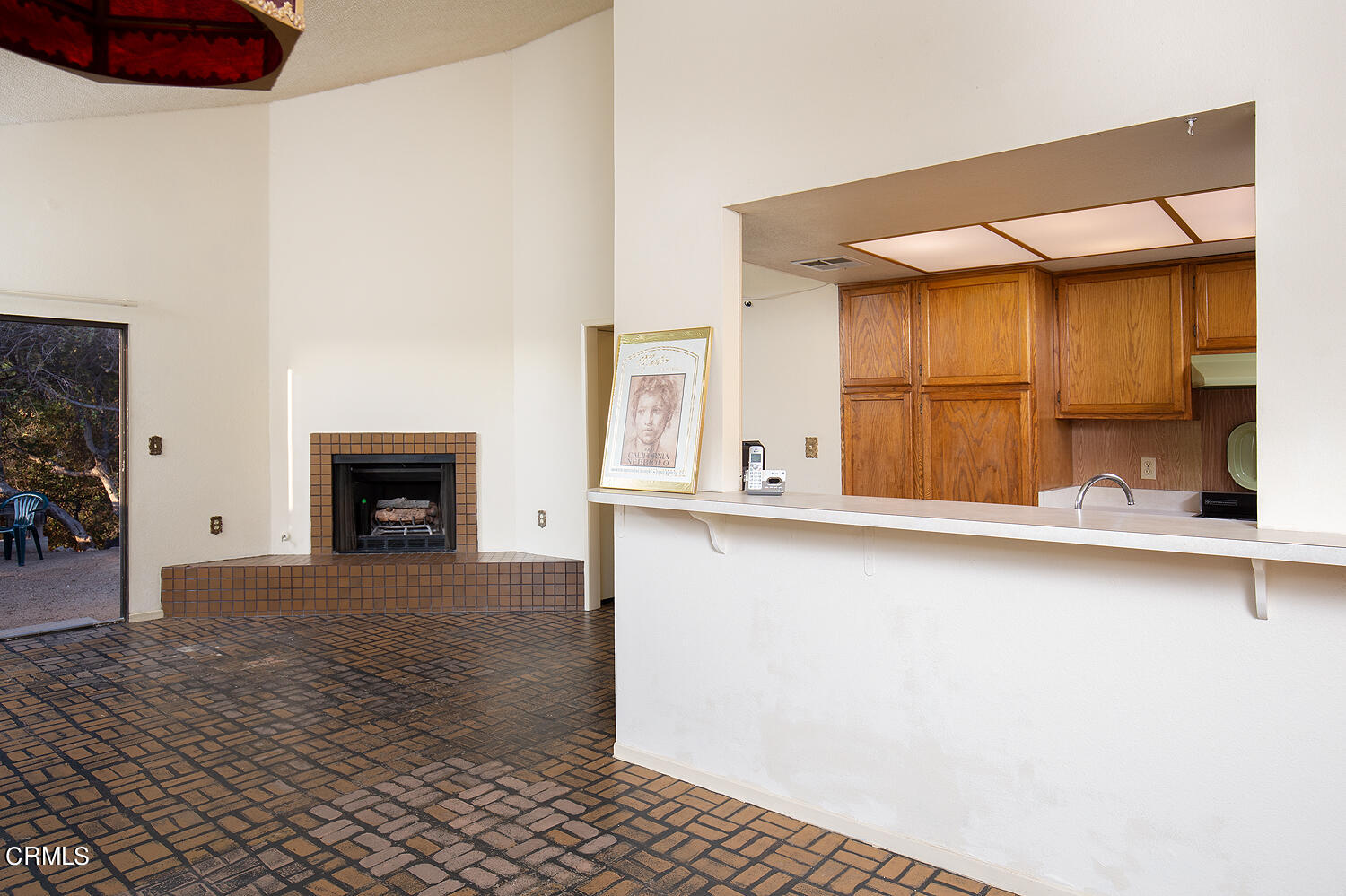 7635 Memory Drive Tujunga, CA 91042 - Photo 7 of 21 a view of an empty room with window and fireplace