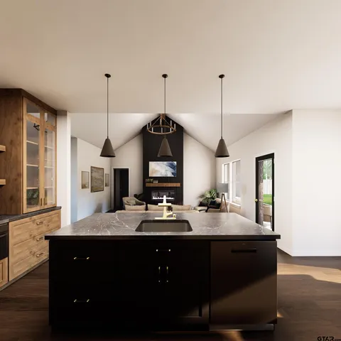 a kitchen with a sink cabinets and window