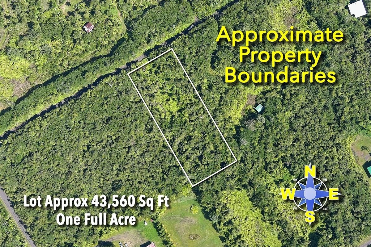 11-1863 Kolea Street Mountain View, HI 96771 - Photo 5 of 16 a sign that is sitting on a wooden wall