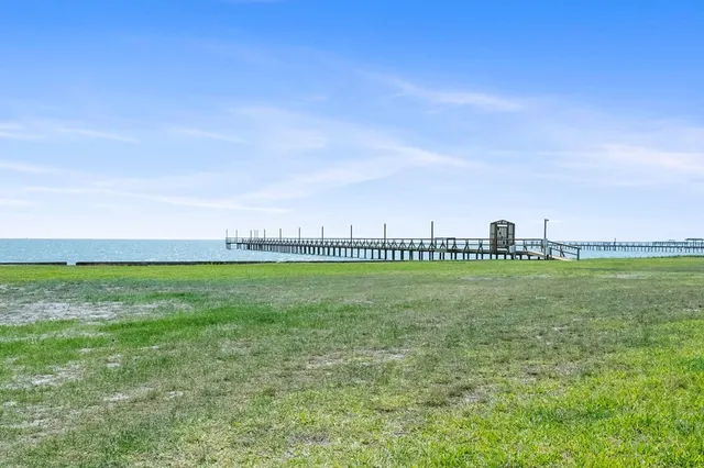 a view of a golf course with a lake