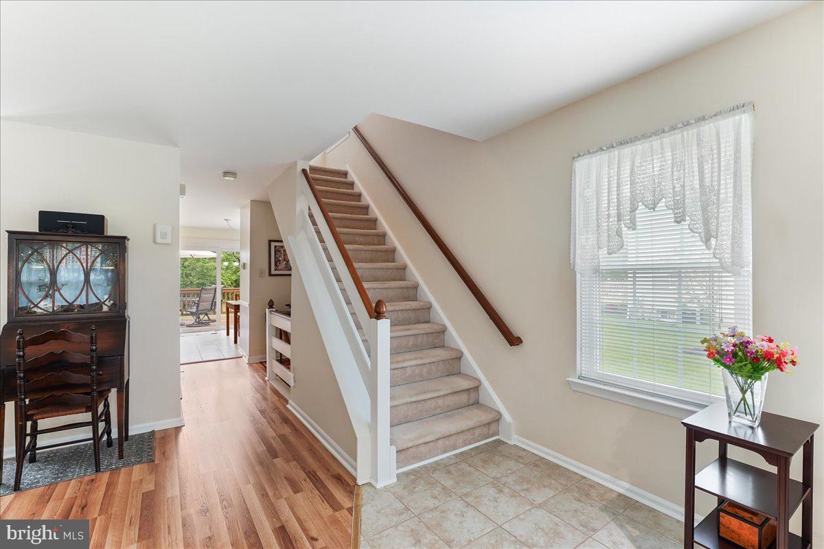 107 Cambridge Circle, Unit 50 Kennett Square, PA 19348 - Photo 12 of 36 Main stairs from foyer to 2nd floor