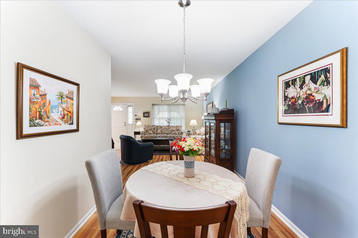 107 Cambridge Circle, Unit 50 Kennett Square, PA 19348 - Photo 9 of 36 Dining area view into living/family room