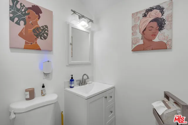 a bathroom with a sink and a toilet