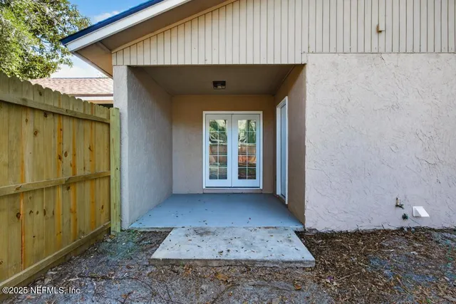 a view of a house with a wooden door