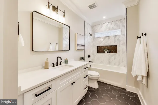 a living room with furniture a rug and a window
