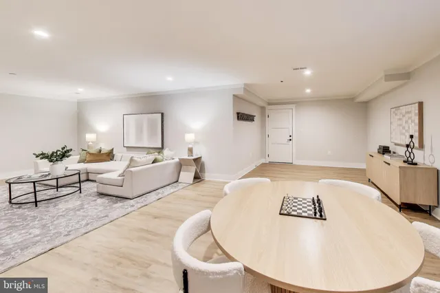 a bedroom with a large bed and a large window