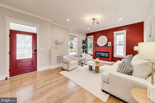 a living room with furniture and a table