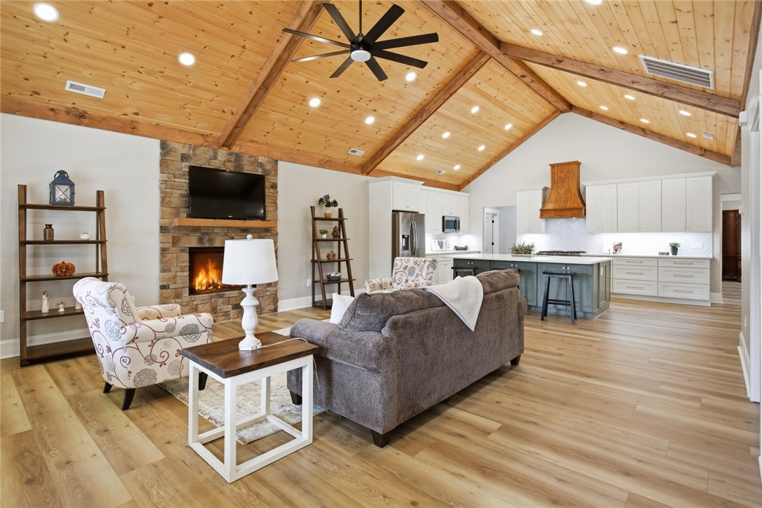 147 McAlister Road West Union, SC 29696 - Photo 5 of 49 This inviting space offers an open layout, vaulted ceilings, and a cozy fireplace for relaxed living.