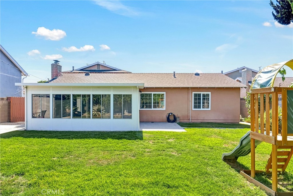 17111 Santa Rita Street Fountain Valley, CA 92708 - Photo 19 of 28 Back of House with Sunroom