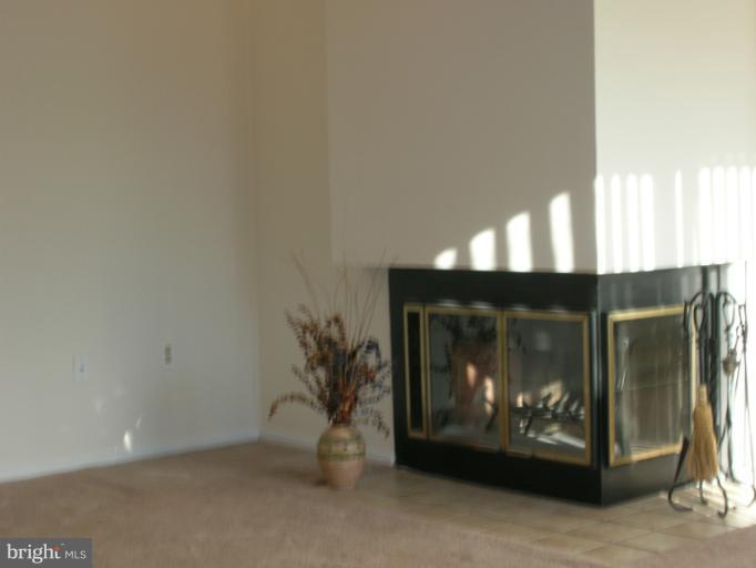 1936 Villaridge Drive, Unit B Reston, VA 20191 - Photo 15 of 22 Living Room Opens to balcony