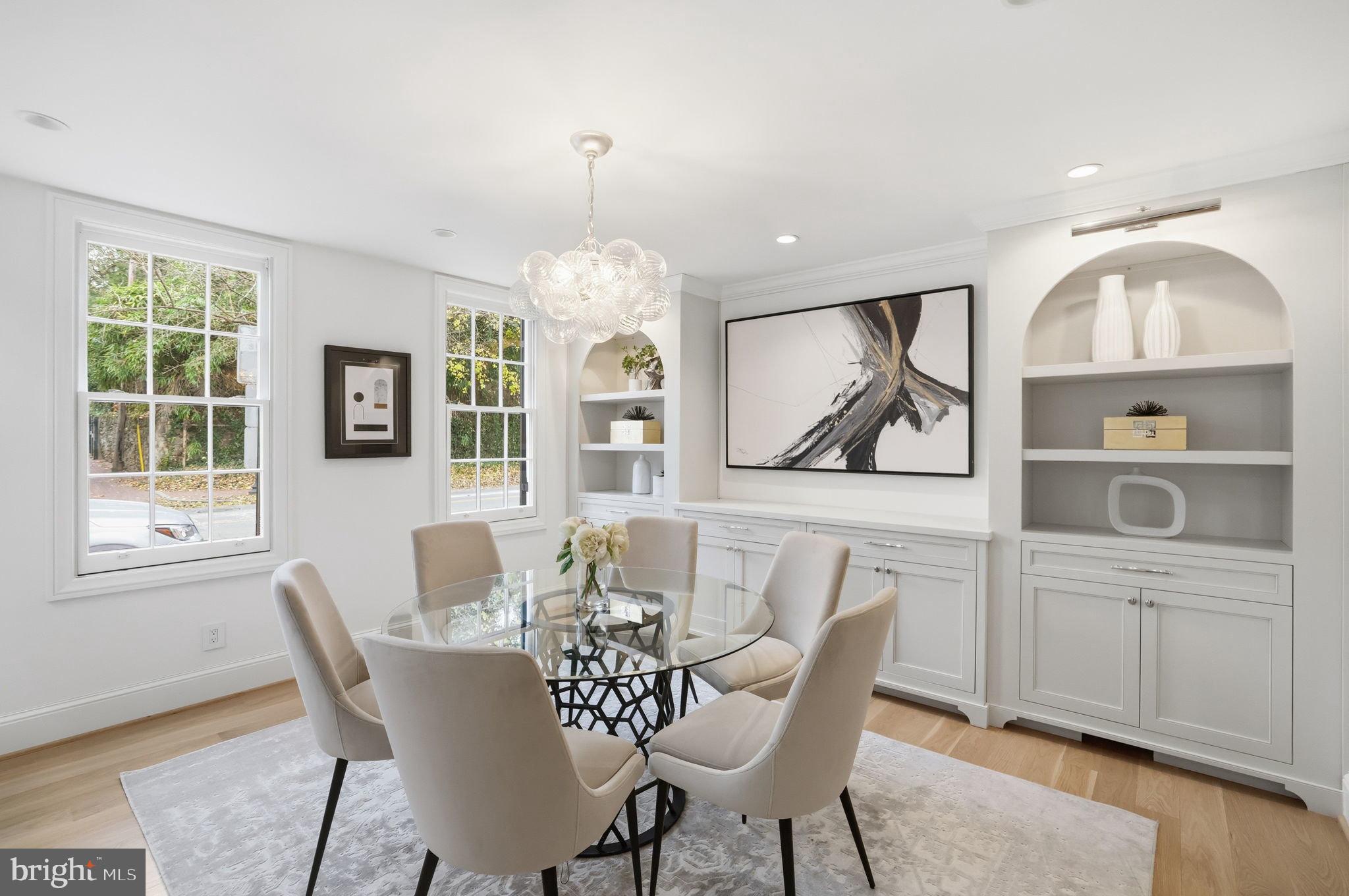 3418 Reservoir Road Northwest Washington, DC 20007 - Photo 13 of 33 a view of a dining room with furniture window and wooden floor
