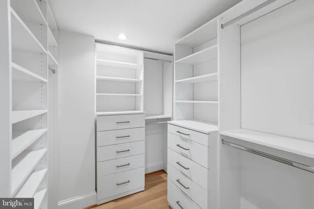 a view of an empty walk in closet