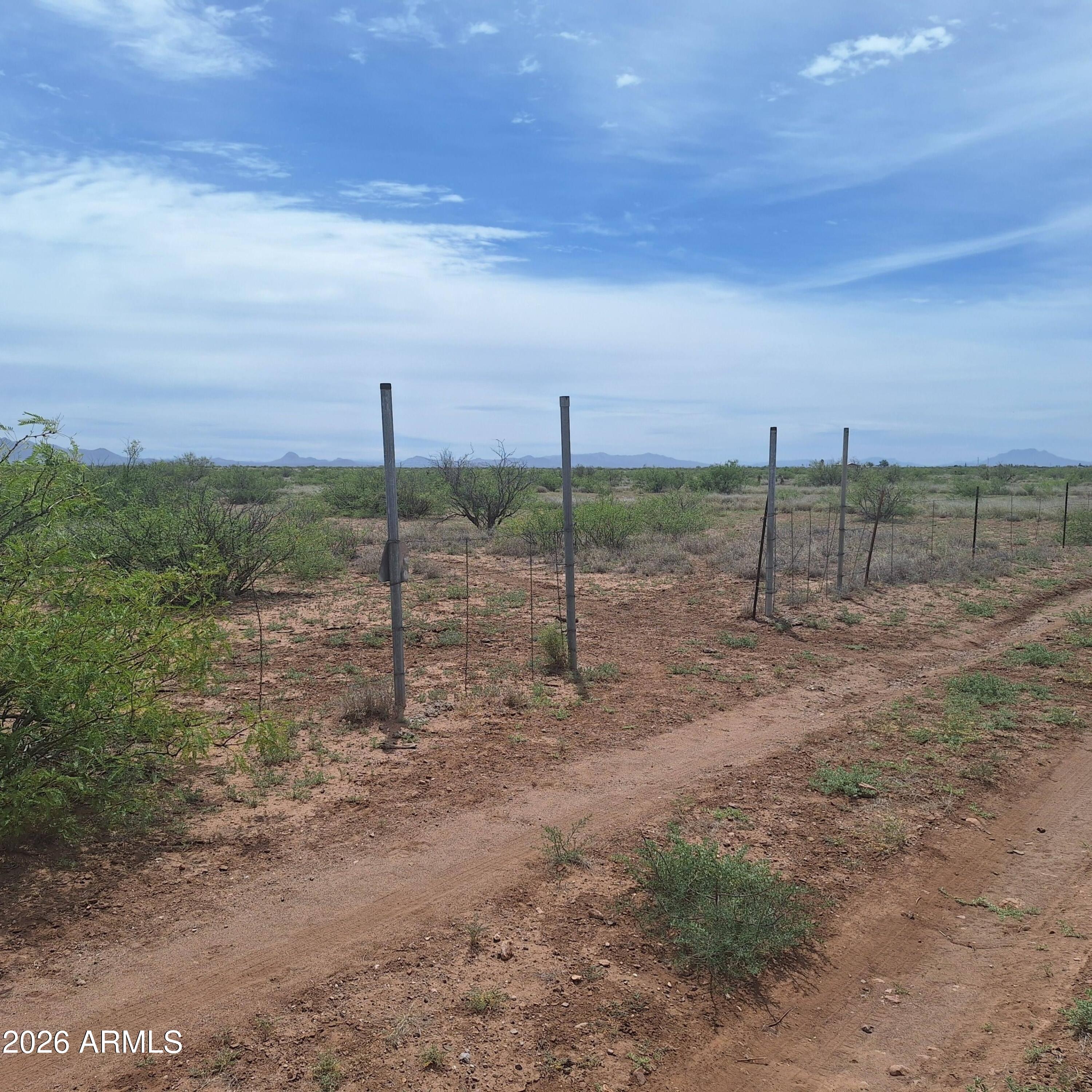 3470 West Double Adobe Road McNeal, AZ 85617 - Photo 4 of 23 a view of a yard with a slide