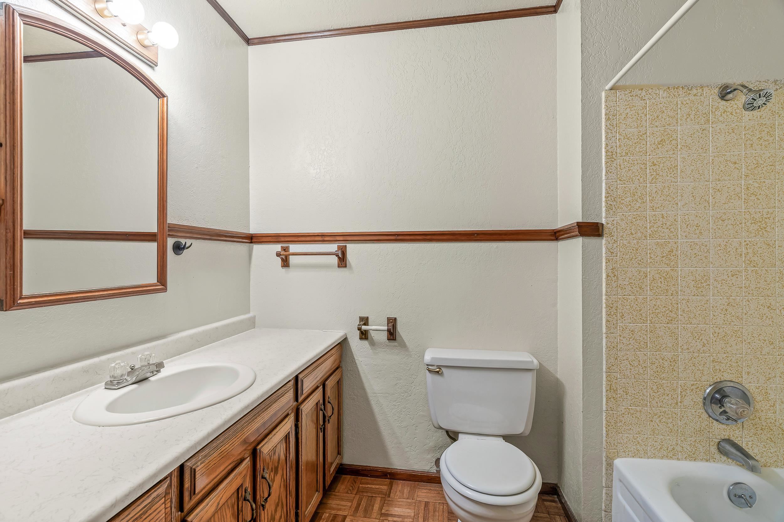 623 Broken Spoke Road Grand Junction, CO 81504 - Photo 19 of 27 a bathroom with a sink a toilet and shower