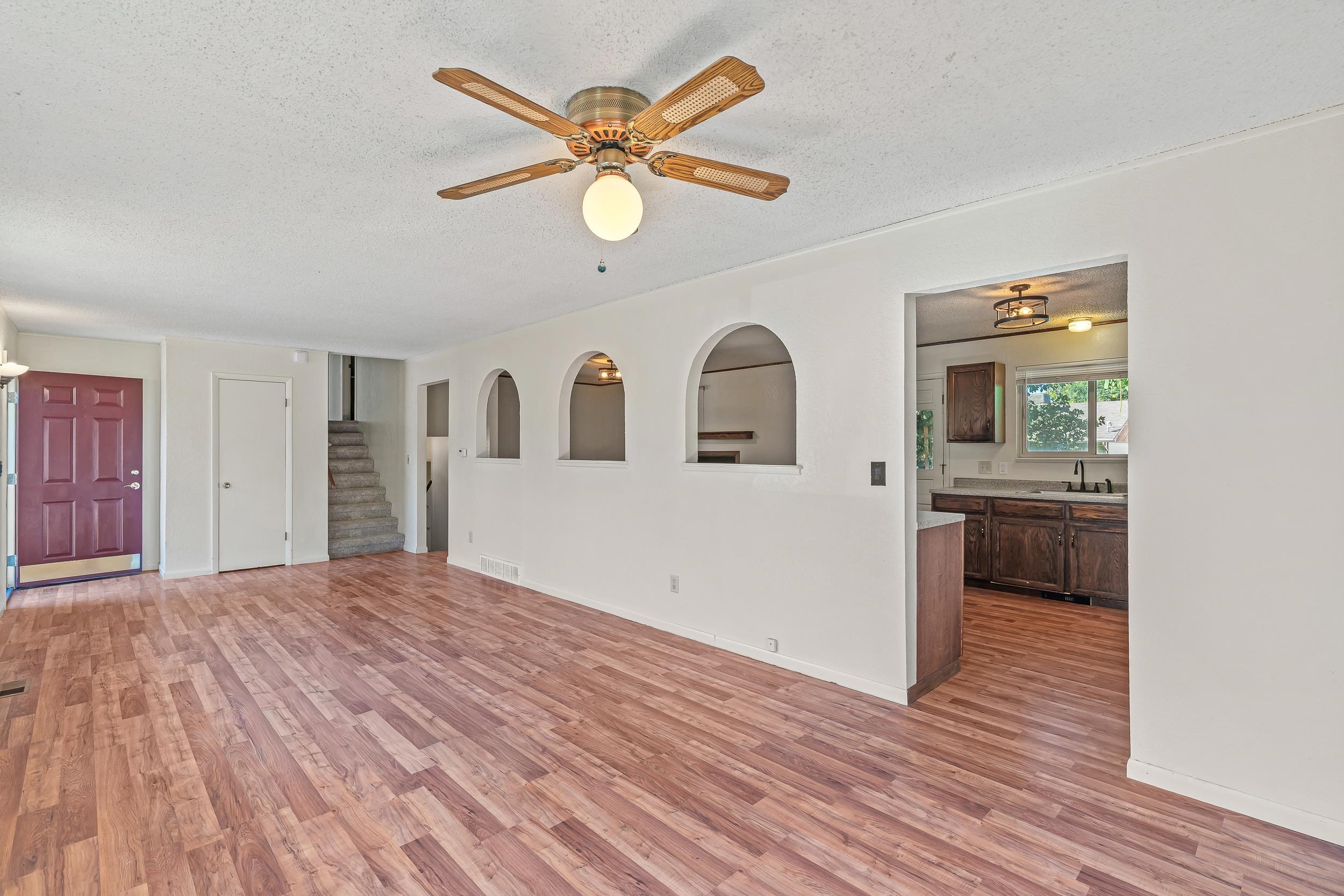 623 Broken Spoke Road Grand Junction, CO 81504 - Photo 4 of 27 a view of a livingroom with a chandelier