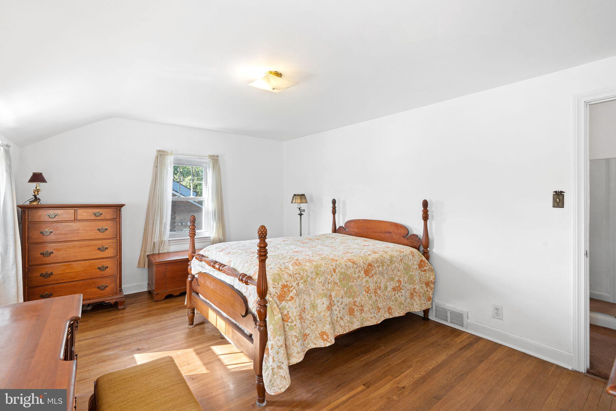 142 Rambling Way Springfield, PA 19064 - Photo 17 of 33 a bedroom with a bed and a window