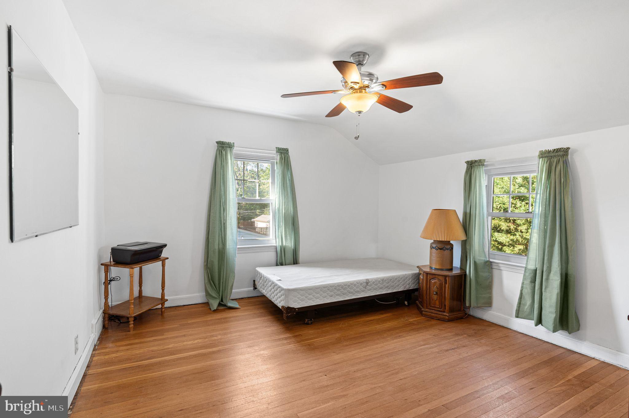 142 Rambling Way Springfield, PA 19064 - Photo 18 of 33 a bedroom with a bed and a window