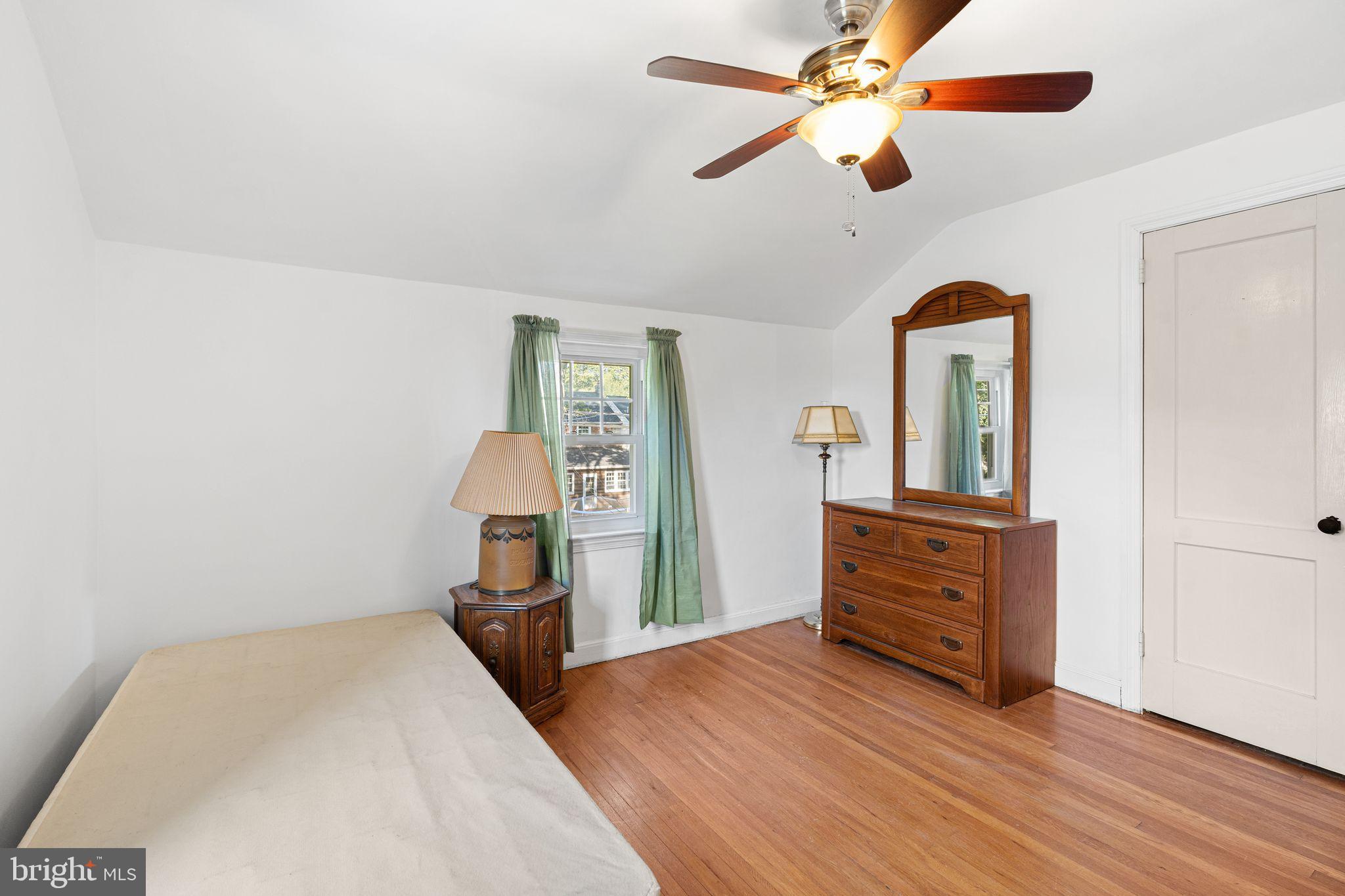 142 Rambling Way Springfield, PA 19064 - Photo 19 of 33 wooden floor in an empty room with a window