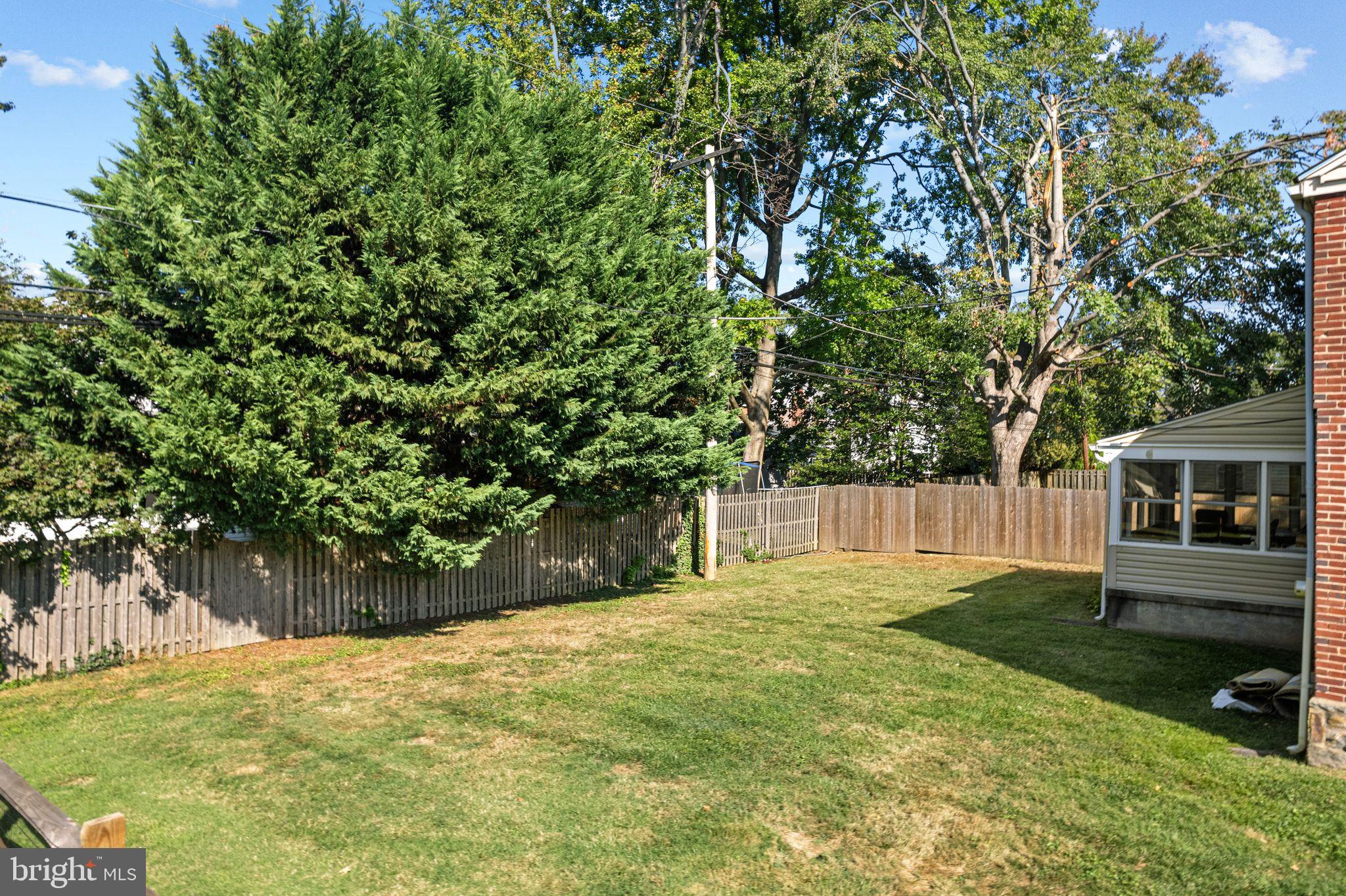 142 Rambling Way Springfield, PA 19064 - Photo 28 of 33 a view of backyard with green space