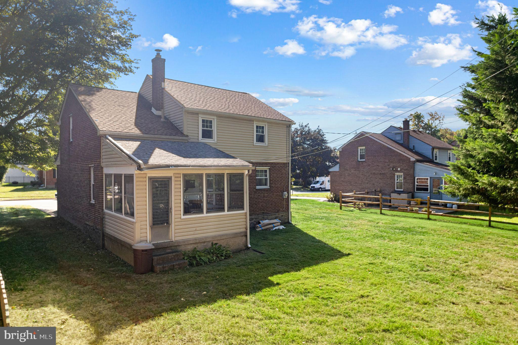 142 Rambling Way Springfield, PA 19064 - Photo 29 of 33 a view of a house with a yard