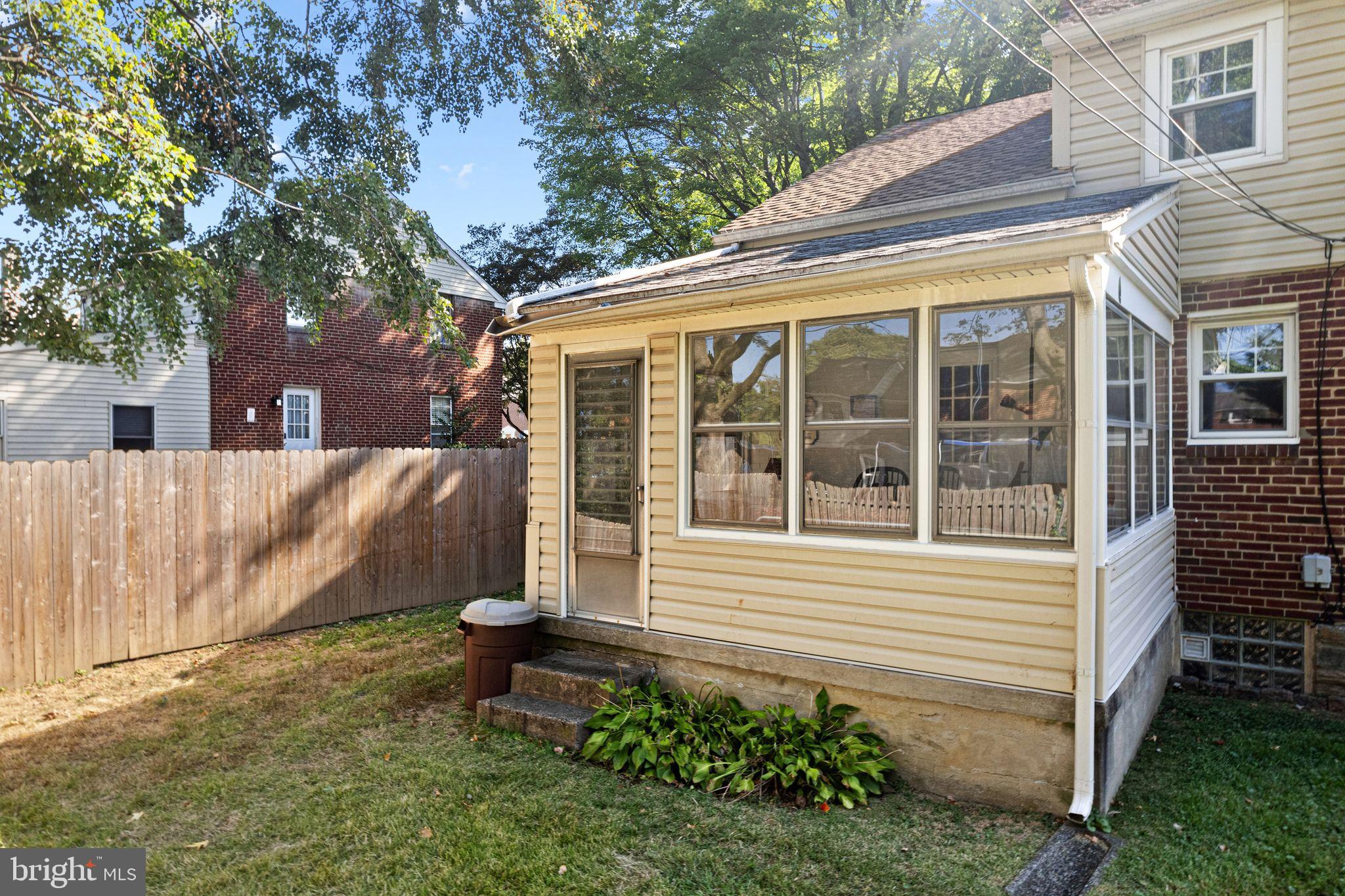 142 Rambling Way Springfield, PA 19064 - Photo 30 of 33 a view of a house with a yard