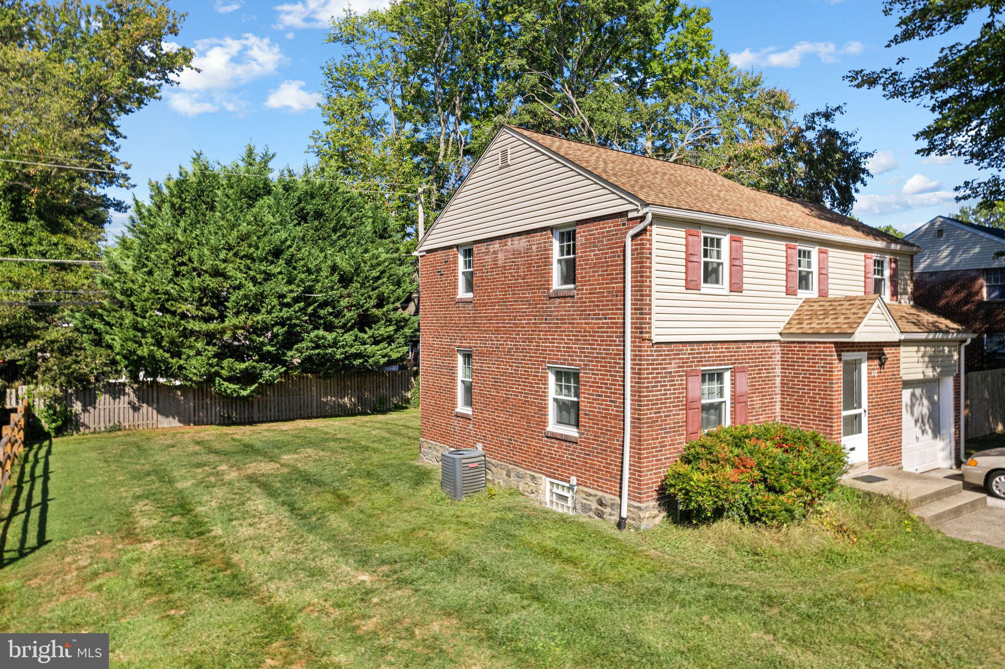 142 Rambling Way Springfield, PA 19064 - Photo 3 of 33 a view of backyard of house with green space