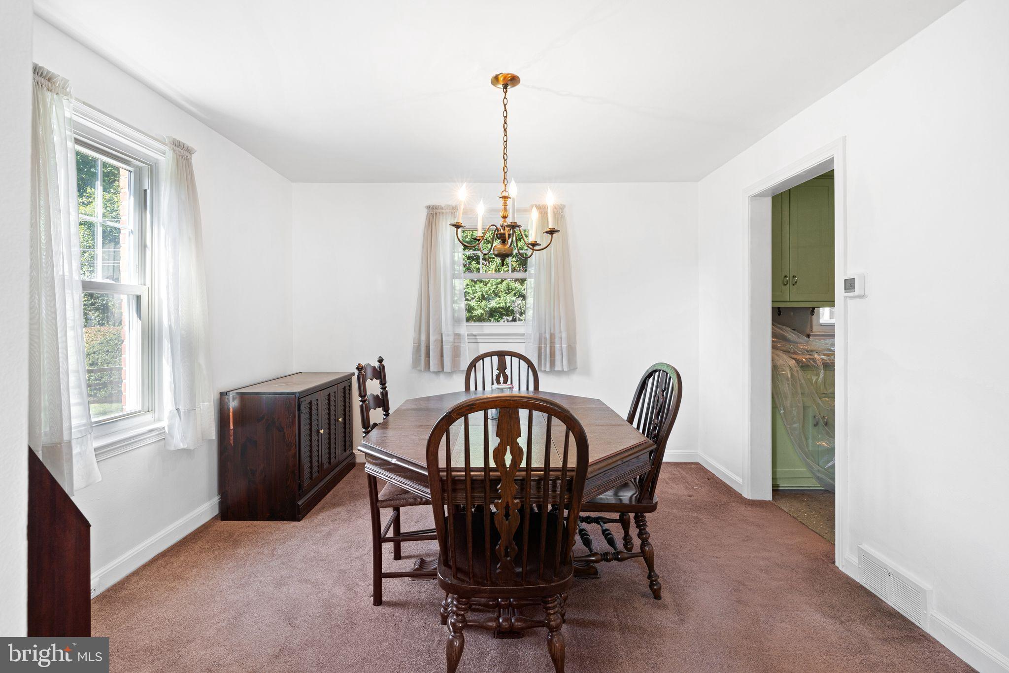 142 Rambling Way Springfield, PA 19064 - Photo 7 of 33 a view of a dining room with furniture window and outside view