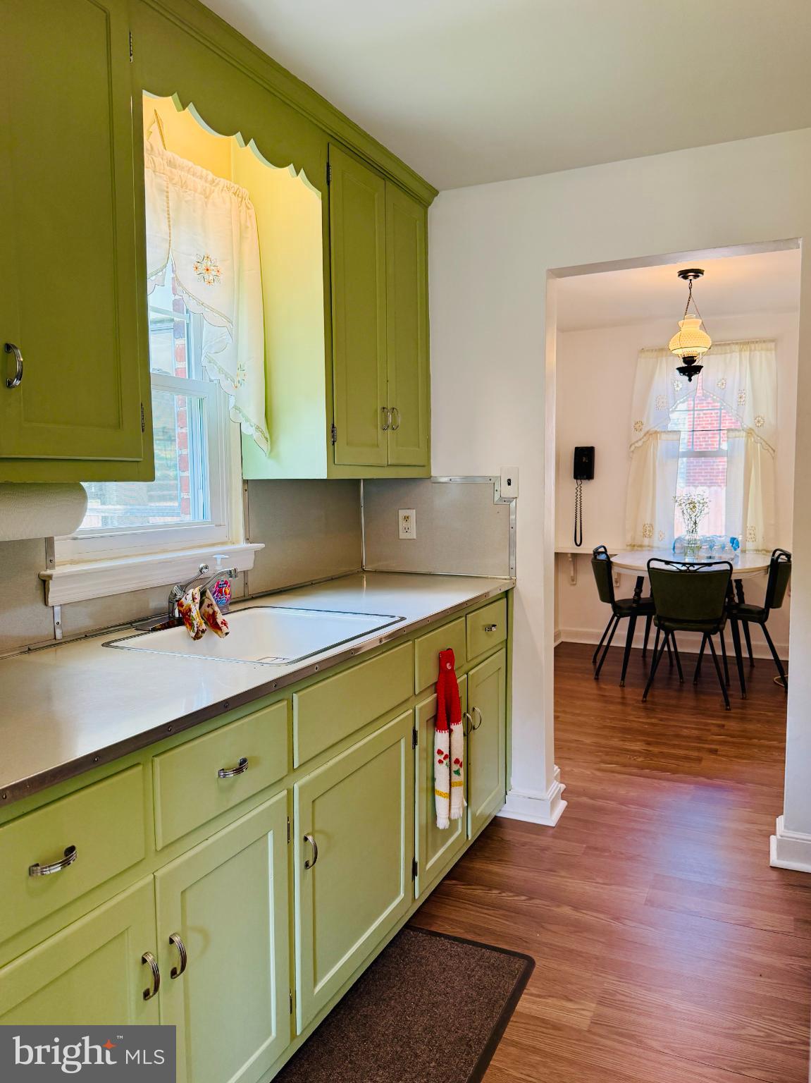 142 Rambling Way Springfield, PA 19064 - Photo 10 of 33 a kitchen with sink and cabinets