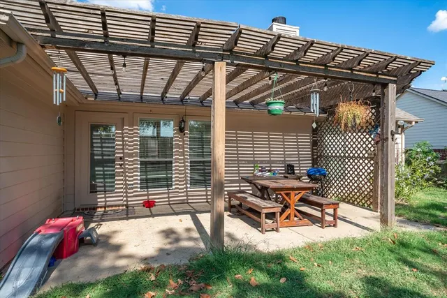 a view of outdoor space with chairs