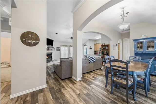 a dining room with furniture and a table
