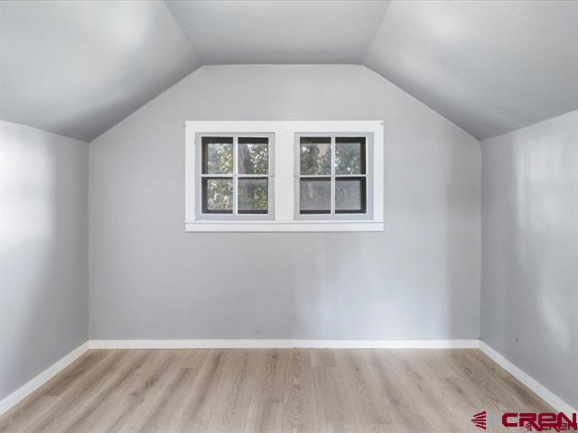 35826 Highway 145 Redvale, CO 81431 - Photo 17 of 22 a view of an empty room with wooden floor and a window