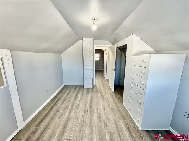 a view of a bedroom with closet