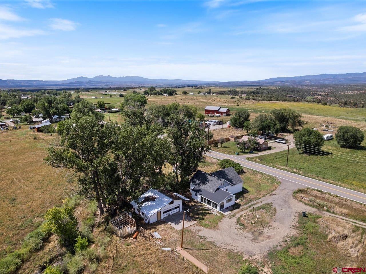 35826 Highway 145 Redvale, CO 81431 - Photo 2 of 22 a view of a city with mountains ocean from the back
