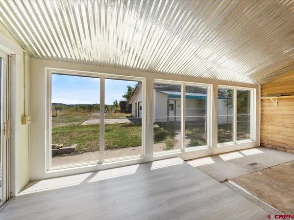a view of a house with a large window