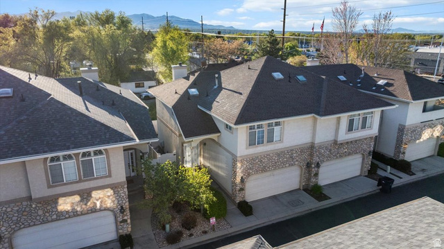 7824 South Sequoia Tree Lane Sandy, UT 84094 - Photo 41 of 43 Aerial perspective of suburban area with a mountainous background