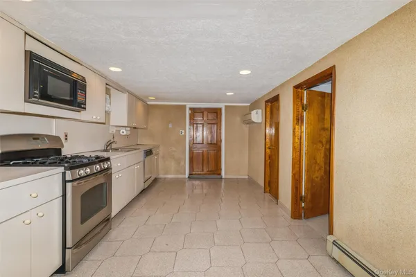 $1,099,000 | 77 Lucille Avenue, Elmont, NY 11003