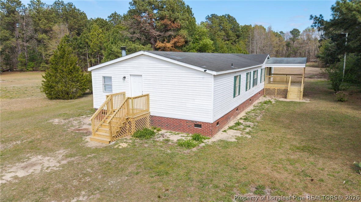 515 Mt Zion Road Red Springs, NC 28377 - Photo 40 of 50 a view of a house with backyard and trees