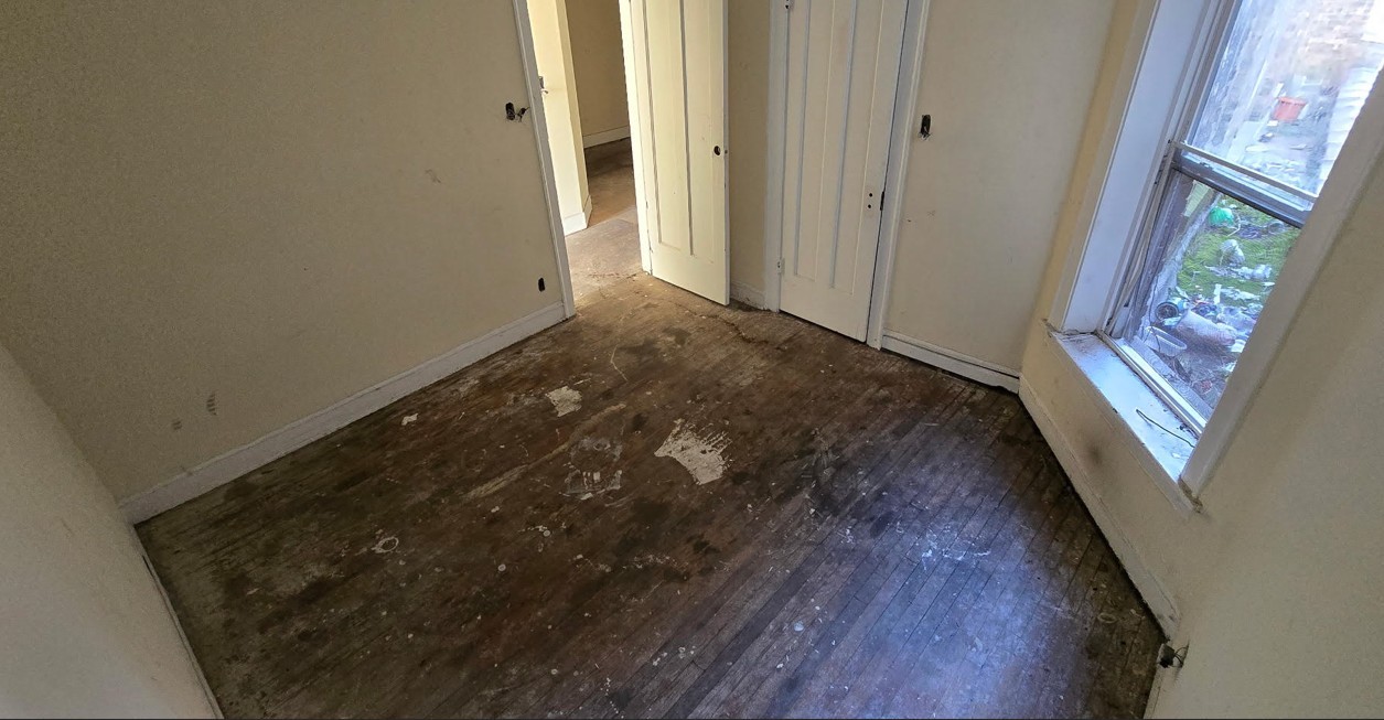 2442 West 63rd Street Chicago, IL 60629 - Photo 6 of 13 a view of empty room with wooden floor