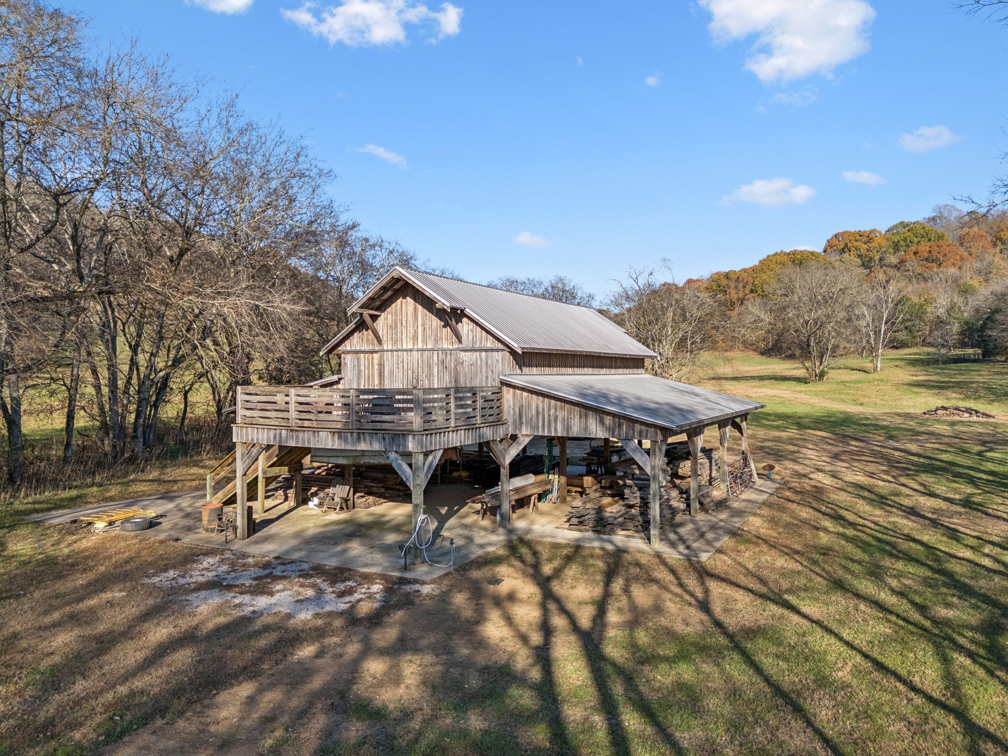 935 Leatherwood Creek Road Pulaski, TN 38478 - Photo 11 of 36 a view of a house with roof deck