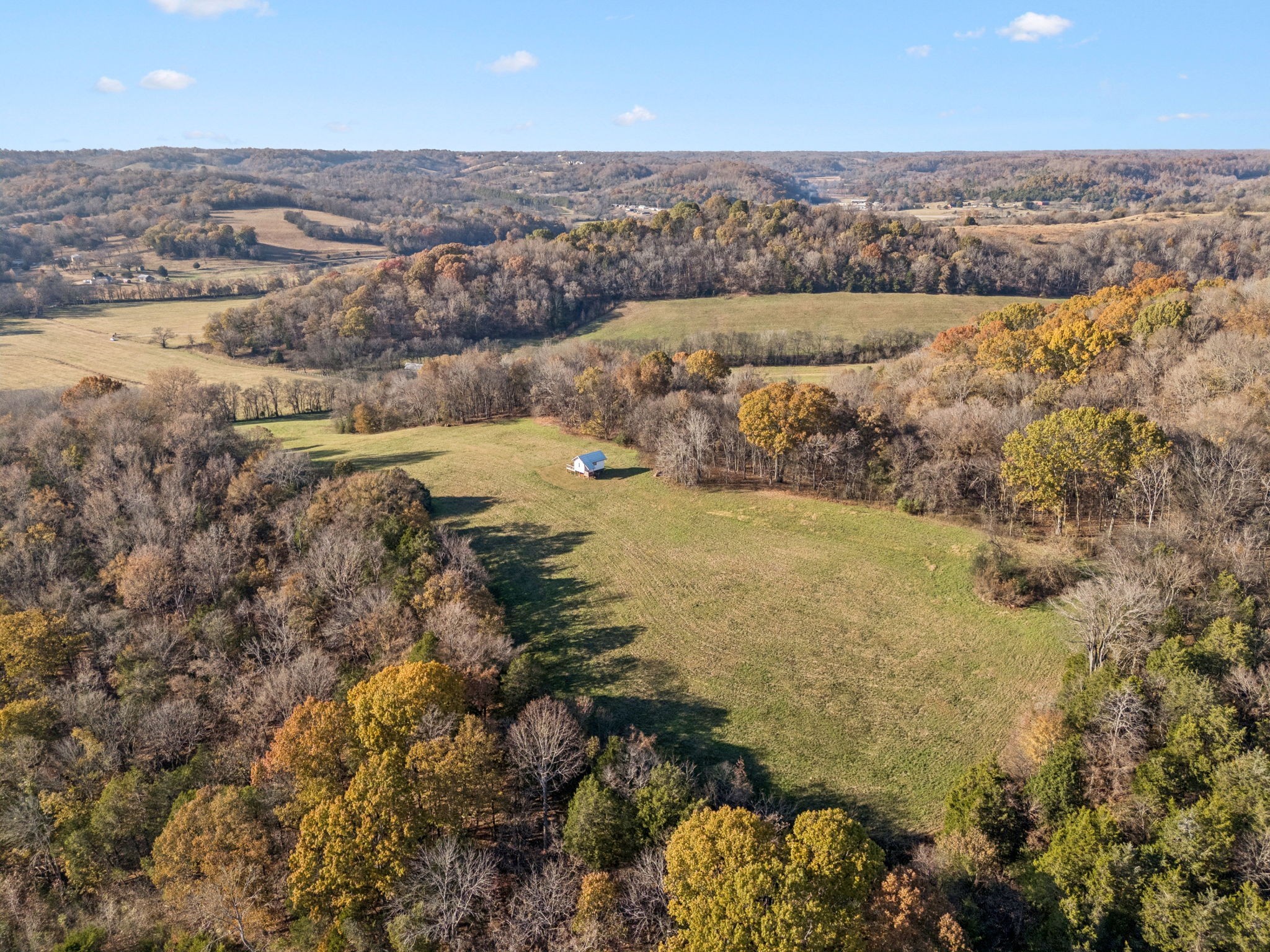 935 Leatherwood Creek Road Pulaski, TN 38478 - Photo 8 of 36 an aerial view of residential houses with outdoor space