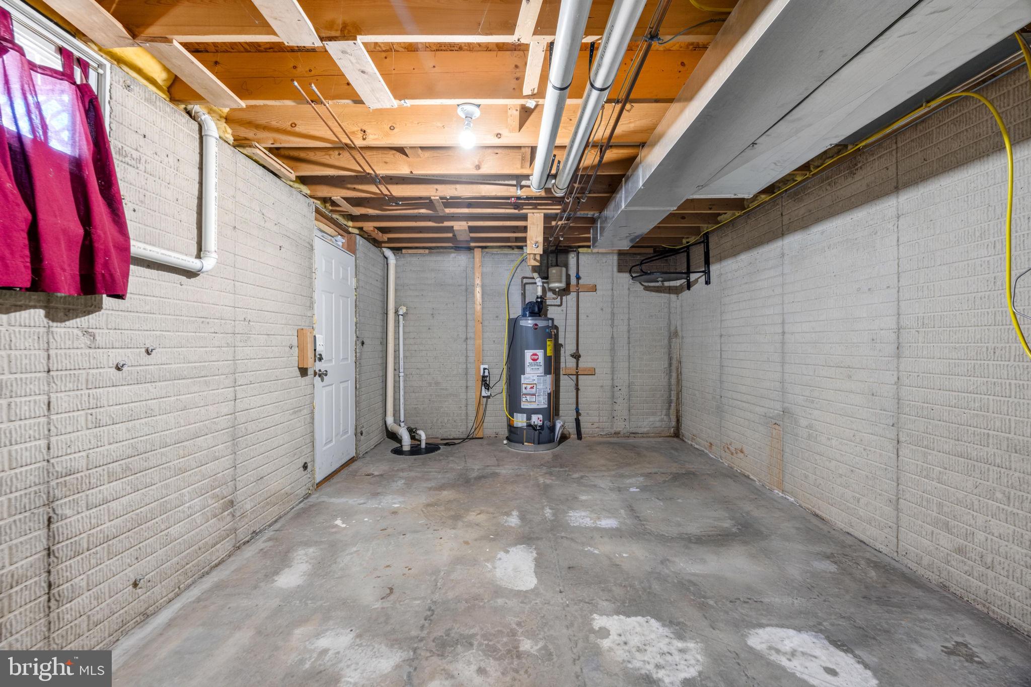 4613 Sandwood Road Sparrows Point, MD 21219 - Photo 67 of 68 Spacious, unfinished basement area.
