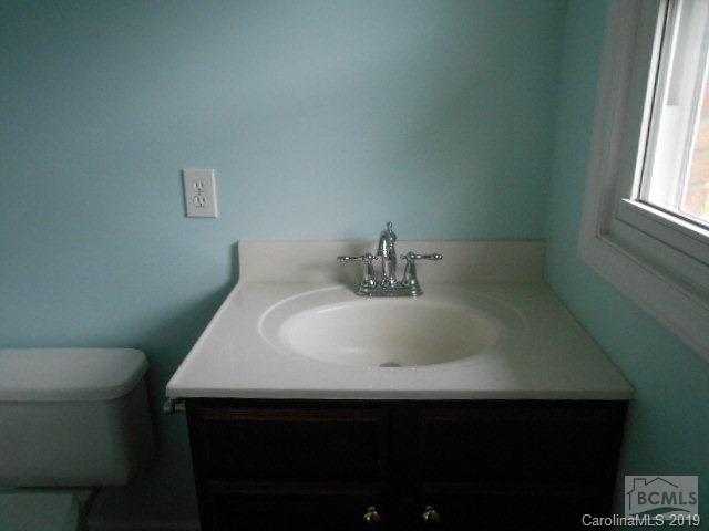 4808 Dentons Chapel Road Morganton, NC 28655 - Photo 2 of 20 a bathroom with a sink and a toilet