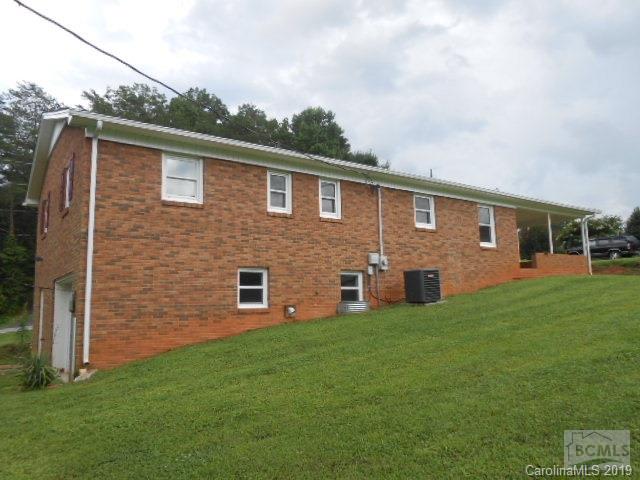 4808 Dentons Chapel Road Morganton, NC 28655 - Photo 14 of 20 a front view of a house with yard