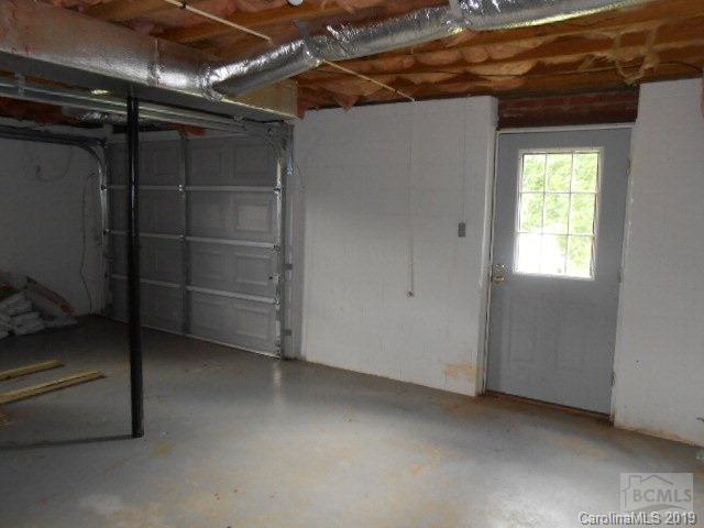4808 Dentons Chapel Road Morganton, NC 28655 - Photo 10 of 20 a view of an empty room with a window