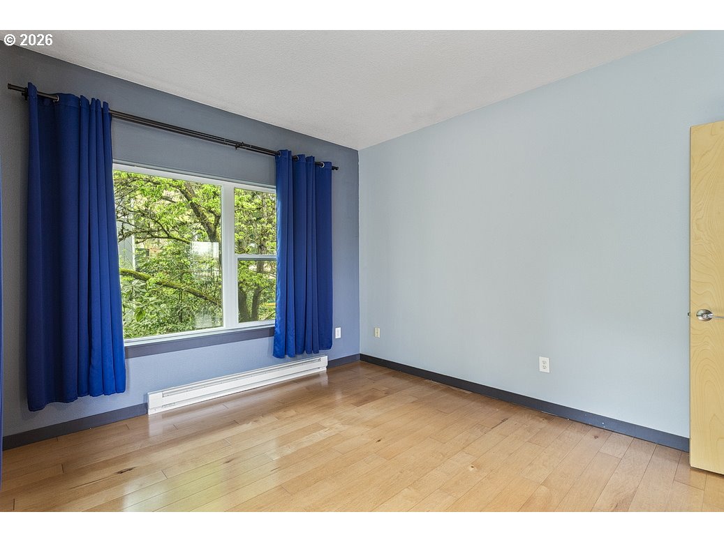 622 South Nevada Street, Unit D Portland, OR 97219 - Photo 23 of 37 a view of an empty room with a window