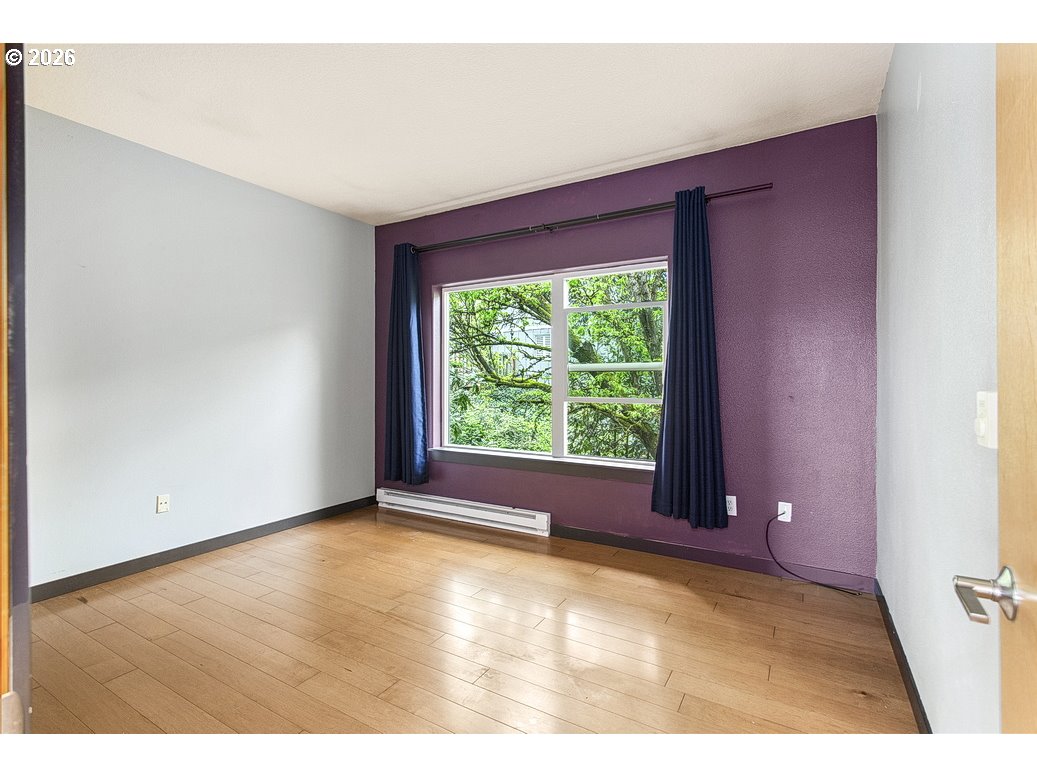 622 South Nevada Street, Unit D Portland, OR 97219 - Photo 30 of 37 a view of an empty room with a window