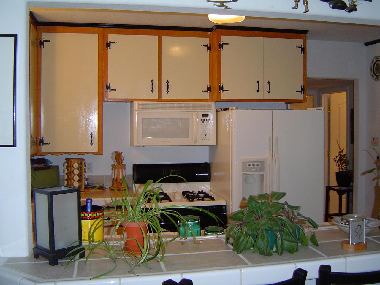 2630 Irwin Road Redding, CA 96002 - Photo 1 of 1 a table chair sitting in a kitchen next to a window