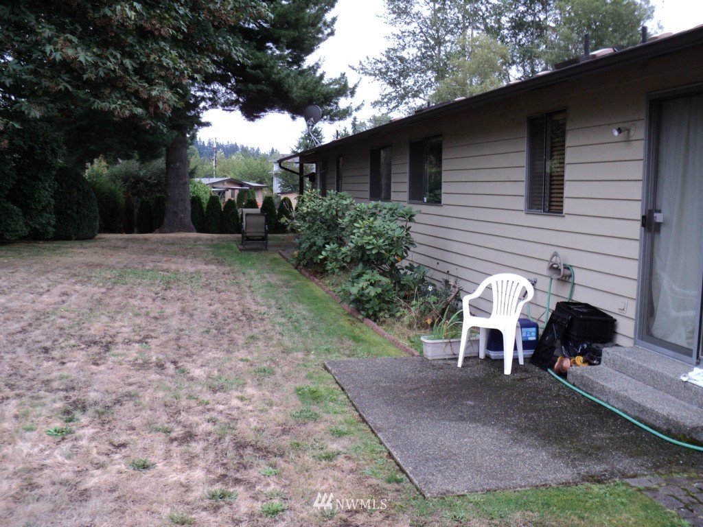 24302 Carter Road Bothell, WA 98021 - Photo 9 of 10 a view of a outdoor space with a patio