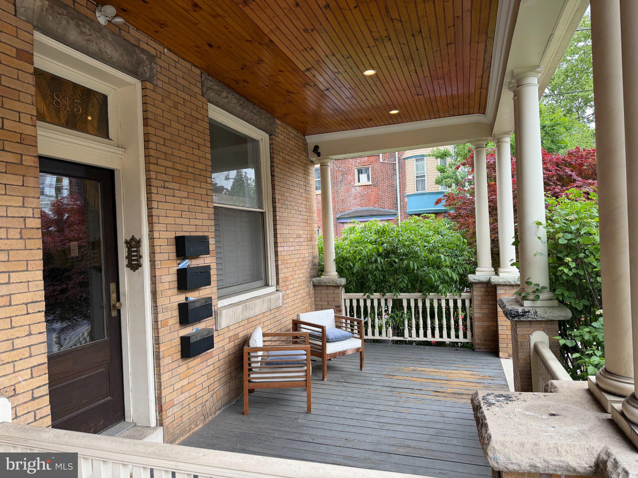 815 South 49th Street Philadelphia, PA 19143 - Photo 64 of 72 Charming porch with lush greenery.