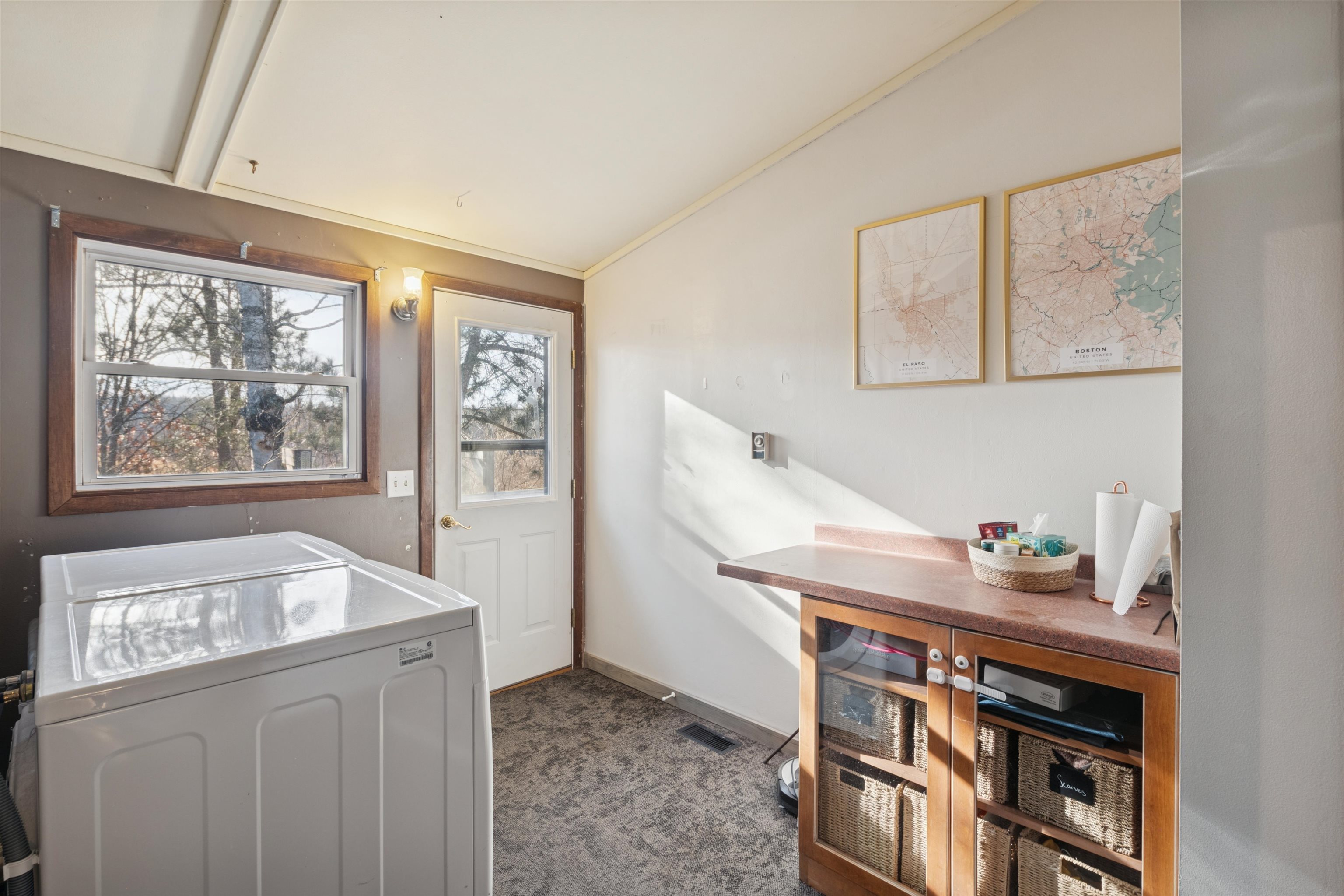 19805 Keystone Road Mason, WI 54856 - Photo 21 of 25 Washroom with crown molding, dark carpet, independent washer and dryer, and cabinet space